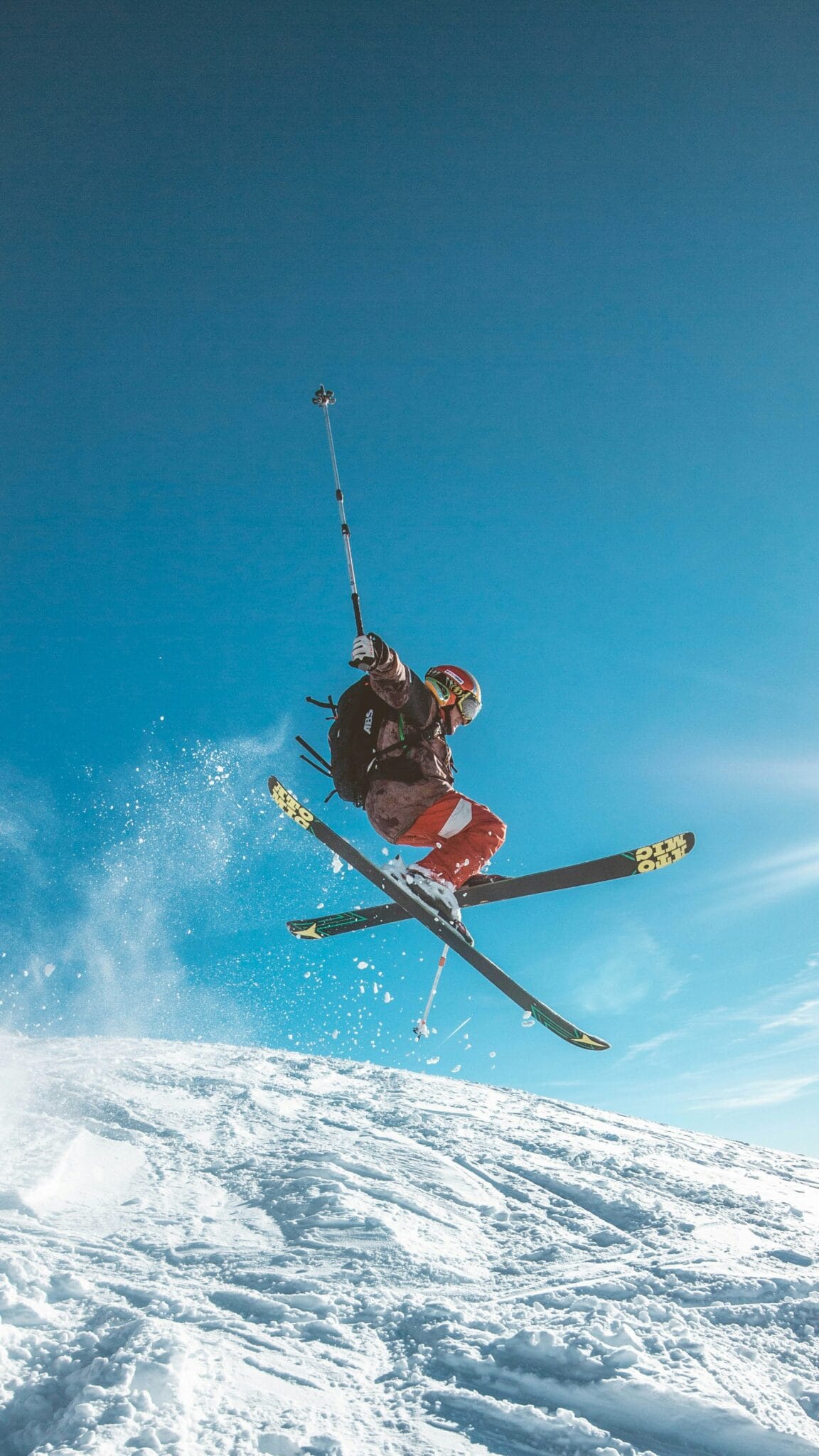 Skier performing jump during skiing adventure in Kufri Himachal Pradesh