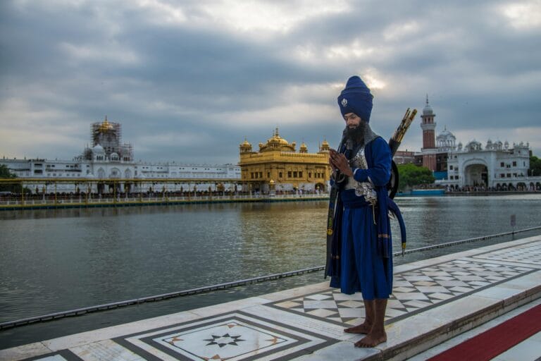 Golden Temple Amritsar reflected in Amrit Sarovar Punjab