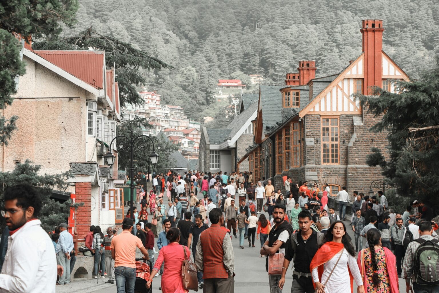 Tourists walking on Shimla Mall Road Himachal Pradesh