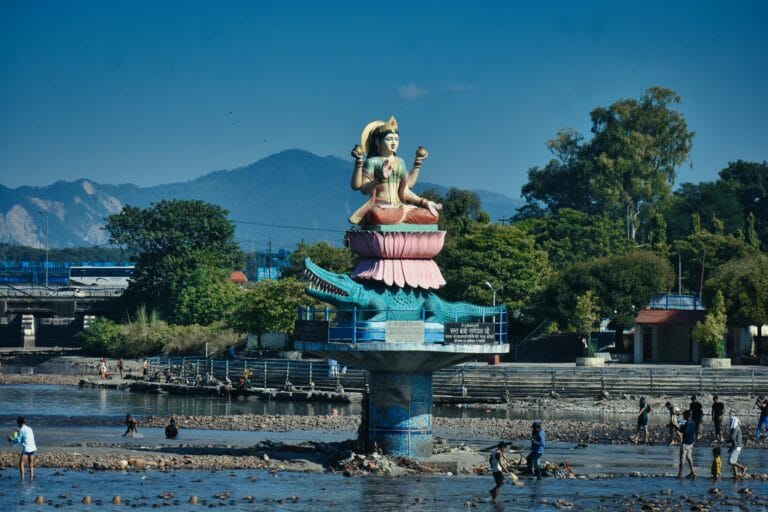 Goddess Ganga statue on the banks of the river in Rishikesh