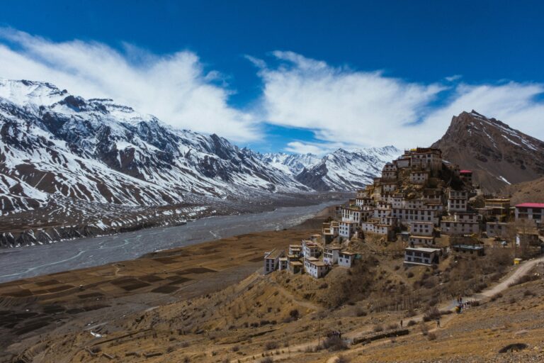 Key Monastery Spiti Valley Himachal Pradesh India view with snowy mountains, historic gompa architecture, and a river for Himalayan states tour planning