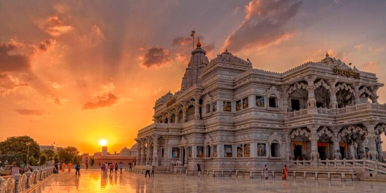 Illuminated Prem Mandir in Vrindavan at sunset
